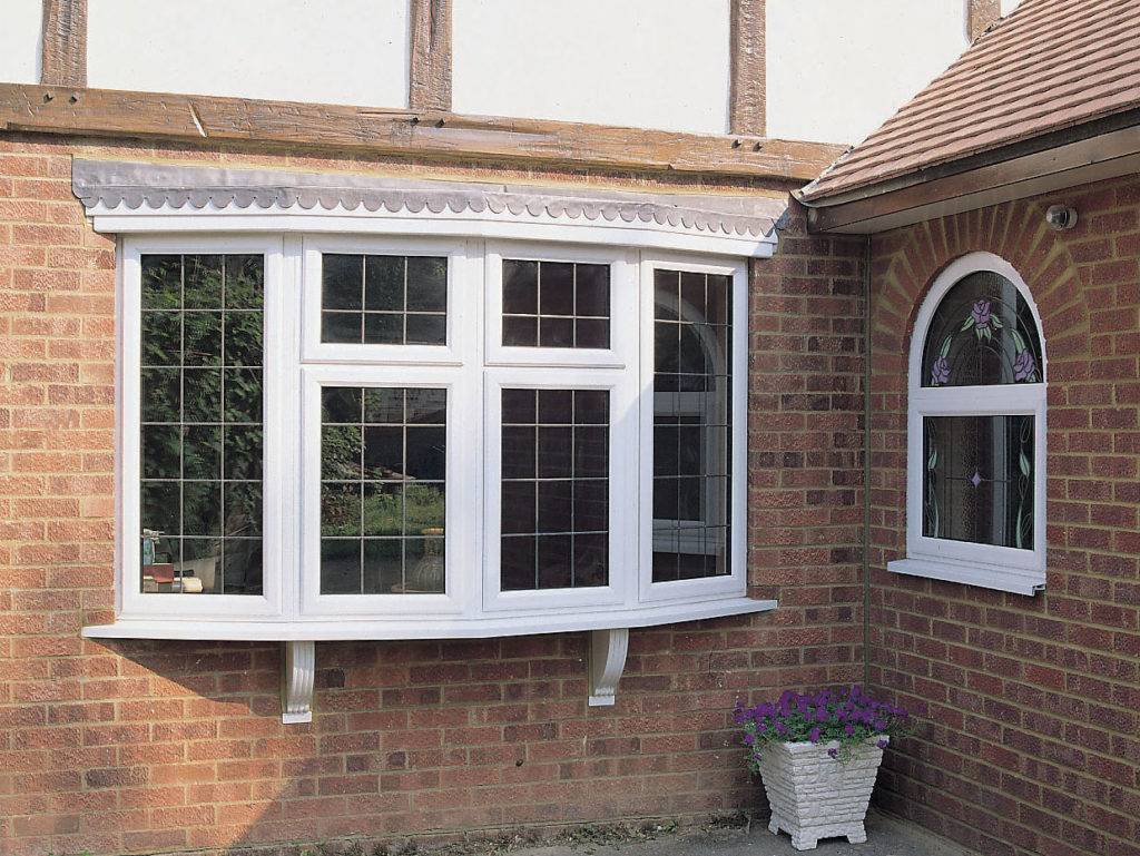 How does double glazing reduce heat loss?